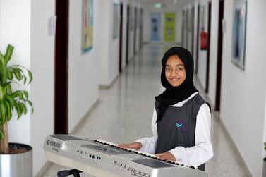 Alia Abdulqader hopes to one day share her musical gifts with other deaf children and show them they should never put limitations on their ambitions. Chris Whiteoak / The National