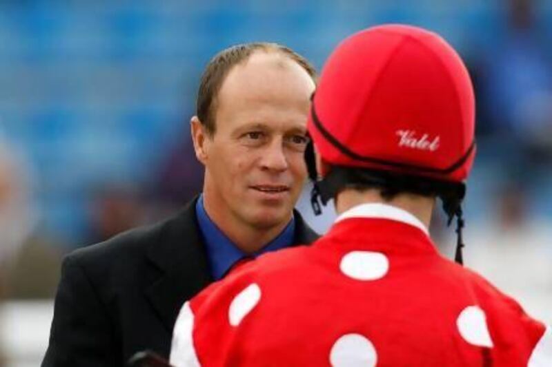 Ernst Oertel, left, is in his second season as the lead trainer at the Al Asayl Stables.