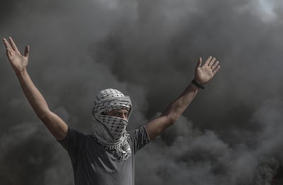 epa06794732 A Palestinian protester takes part in the clashes during a Friday protest near the Israeli border in east Gaza City, 08 June 2018. Reports state that a twelve year old boy and other three Palestinians were killed and more than 600 protesters were wounded during the clahses near the border eastern Gaza Strip. Protesters plan to call for the right of Palestinian refugees across the Middle East to return to homes they fled in the war surrounding the 1948 creation of Israel.  EPA/MOHAMMED SABER