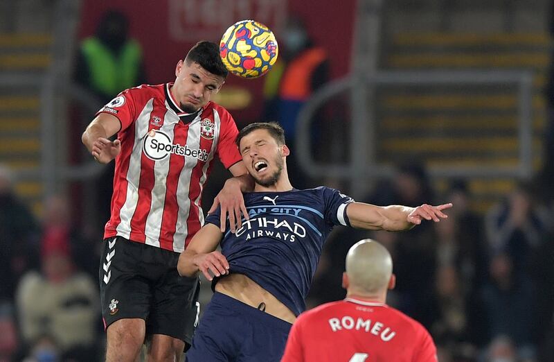 Southampton's Armando Broja challenges Manchester City's Ruben Dias . EPA