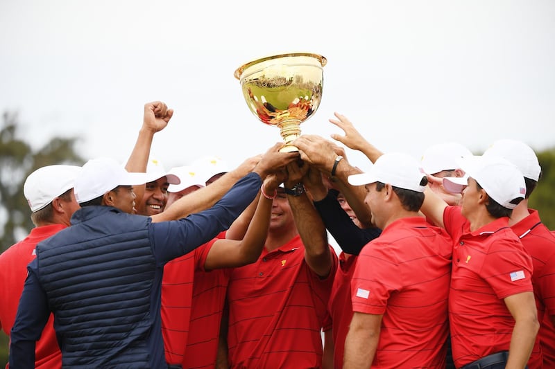 Playing Captain Tiger Woods and the United States team celebrate. Getty