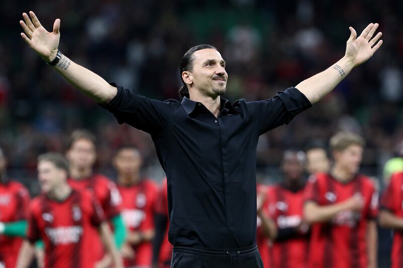 Zlatan Ibrahimovic of AC Milan in familiar pose as he soaks up the adulation from supporters at San Siro. Getty Images