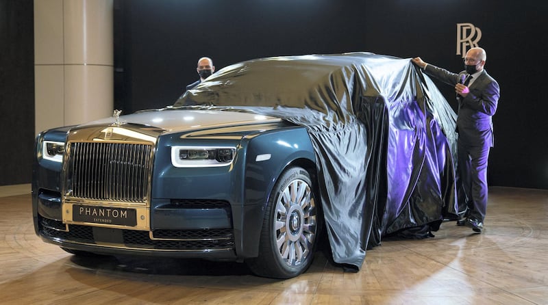 Cesar Habib, Rolls-Royce's regional director, pulls the covers off the Phantom Iridescent Opulence.