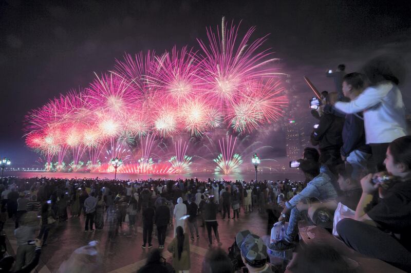 Abu Dhabi, United Arab Emirates - Fireworks display at Abu Dhabi Corniche, Breakwater.  Leslie Pableo for The National