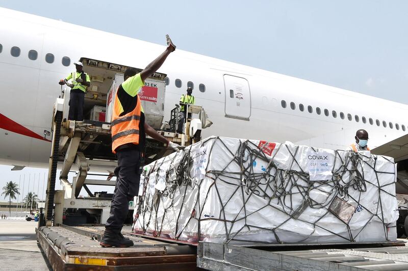 The AstraZeneca vaccine shipment is unloaded from a plane in Abidjan. Ivory Coast received 504,000 doses of the vaccine. AFP