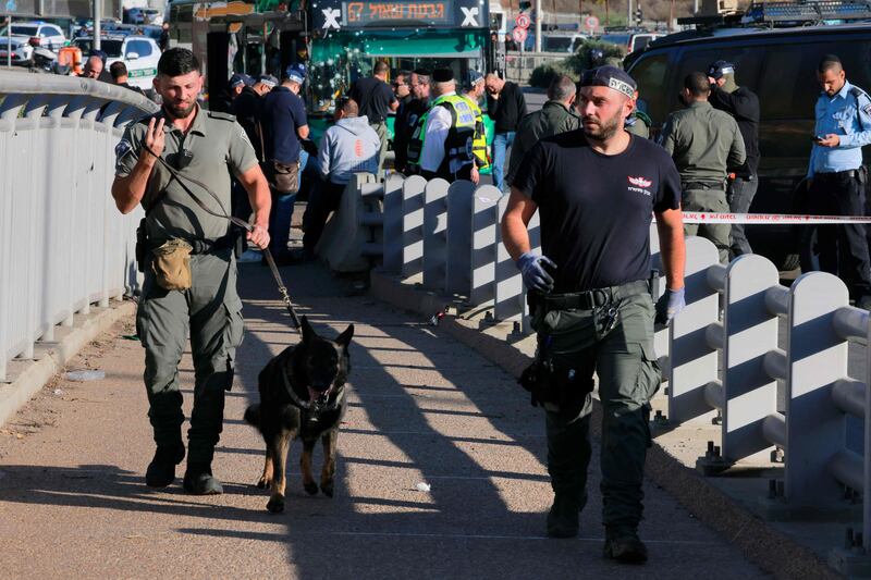 An Israeli security forces canine team in Jerusalem following explosion at a bus stop. AFP