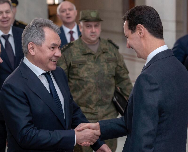 epa07448916 A handout photo made available by the official Syrian Arab News Agency (SANA) shows Syrian President Bashar Assad (R) receiving Russian Defense Minister Sergey Shoygu (L), Damascus, Syria, 19 March 2019. According to SANA, Assad said the Russian-Syrian coordination, especially in the military and political domains, were one of the decisive factors of Syrias steadfastness in the face of terrorism.  EPA/SANA HANDOUT  HANDOUT EDITORIAL USE ONLY/NO SALES