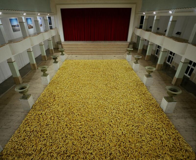 Gu Dexin’s work consisting of thousands of fresh bananas arranged on the floor. Courtesy Galleria Continua