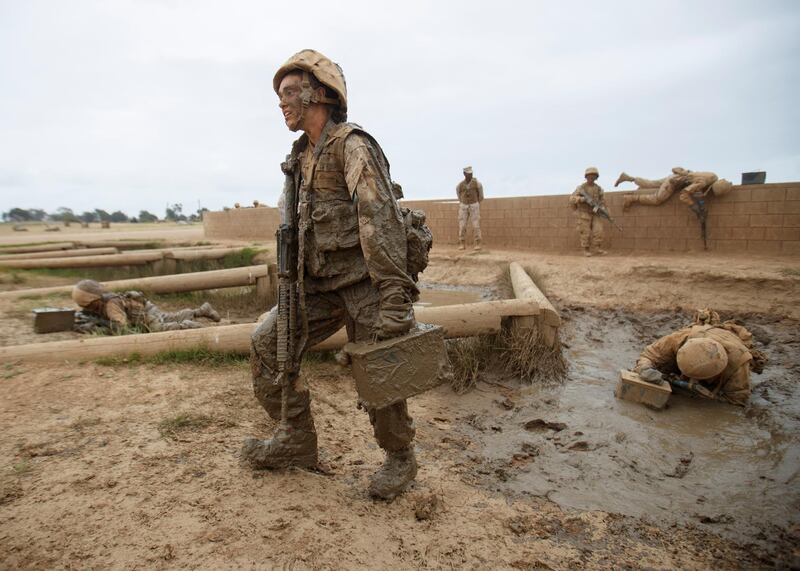 A female recruit from US Marine Corps Recruit Depot San Diego participates in the gruelling crucible training as their platoon breaks a barrier becoming the first ever women Marines trained at Camp Pendleton, California, US. Reuters