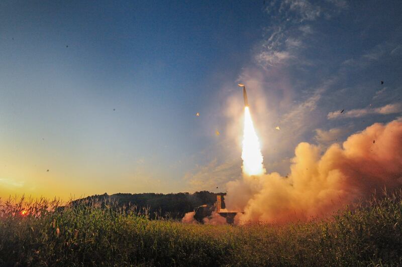 South Korea's short-range Hyunmoo ballistic missiles was seen roaring into the sky in the pale light of dawn from a launch site on the country's east coast.  EPA