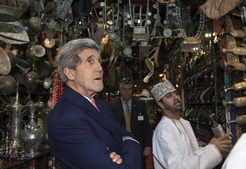 Mr Kerry looks at daggers as he visits the Mattrah Souq in Muscat. Iran, the United States and the European Union began an unscheduled second day of talks on Monday over disagreements blocking the resolution of a confrontation over Tehran’s nuclear program, U.S. and Iranian officials said. Nicholas Kamm / AP