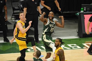 Khris Middleton of the Milwaukee Bucks reacts after hitting the game-winning shot in overtime against the Miami Heat. AFP