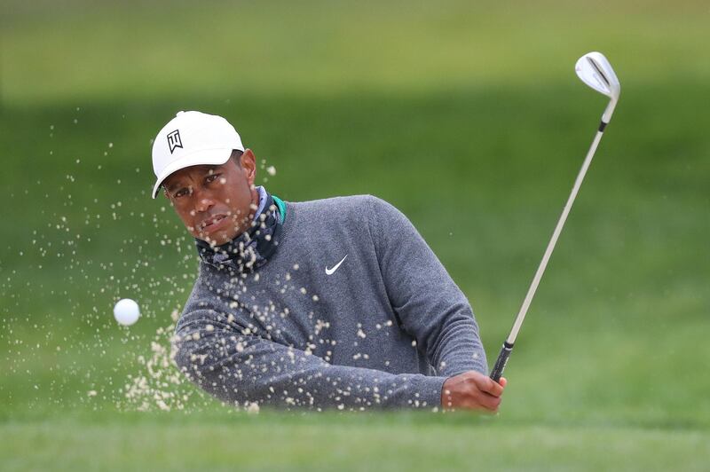 Tiger Woods plays a shot from the bunker during a practice round prior to the 2020 PGA Championship at TPC Harding Park. AFP
