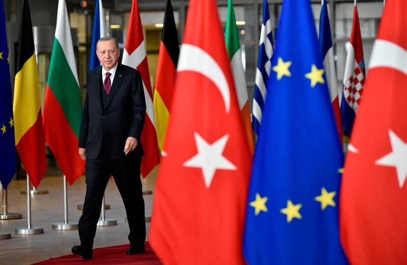 Turkish President Erdogan arrives before a meeting with European Commission President and EU Council President at the EU headquarters in Brussels. AFP