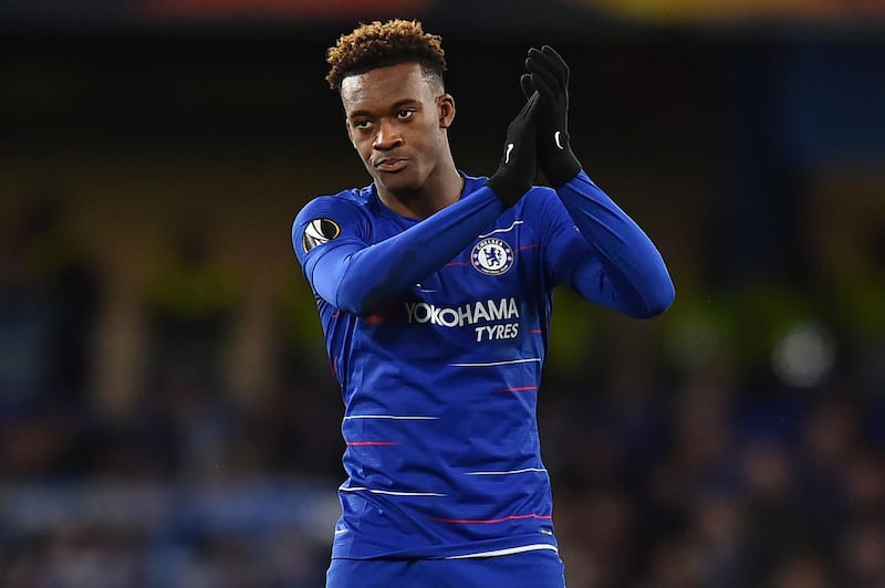 (FILES) In this file photo taken on March 7, 2019 Chelsea's English midfielder Callum Hudson-Odoi applauds supporters on the pitch after the first leg of the UEFA Europa League round of 16 football match between Chelsea and Dynamo Kiev at Stamford Bridge stadium in London. Chelsea teenager Callum Hudson-Odoi was called up by England for the first time on Monday, March 18, 2019 amid a series of withdrawals due to injury. / AFP / Glyn KIRK                  
