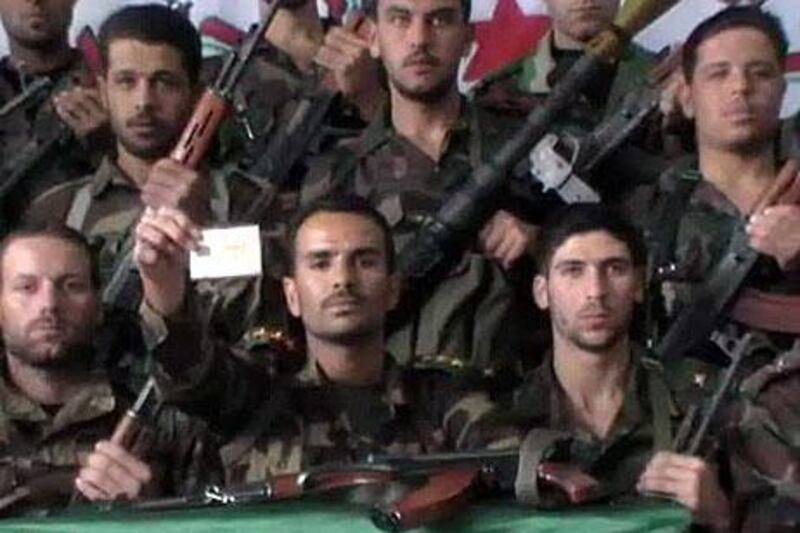 In a video posted on YouTube last week a dissident Syrian soldier holds up his ID card. The FSA’s leadership says it is a growing threat to Bashar Al Assad.