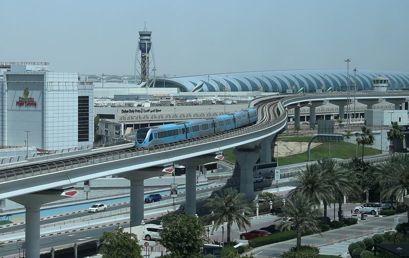 DUBAI, UNITED ARAB EMIRATES , April 26– 2020 :- View of the Dubai Metro coming from airport terminal 1 metro station in Dubai. Dubai Metro and bus services resume today after the lockdown in Dubai. (Pawan Singh / The National) For News/Standalone/Online/Instagram/Stock. 