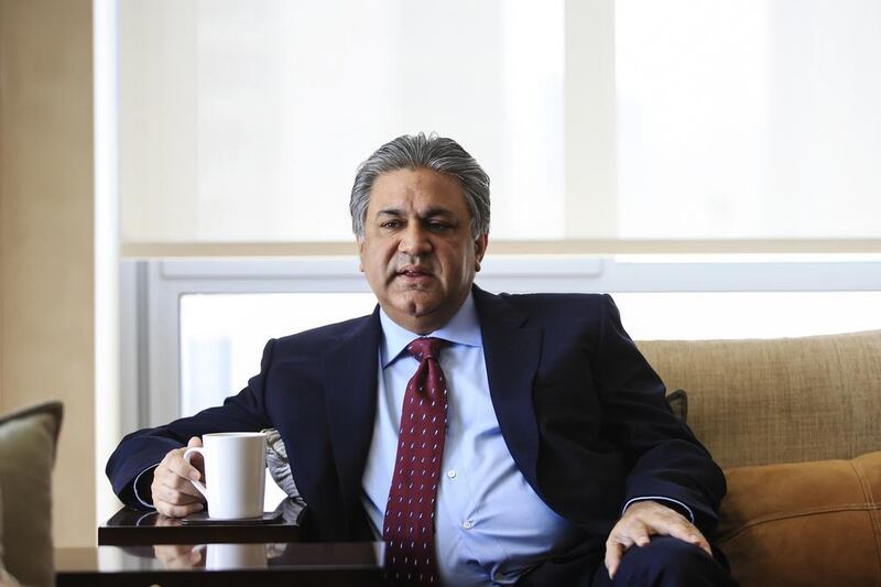 Abraaj Group chief executive Arif Naqvi is nearing completion of an out-of-court settlement with a creditor over a bounced cheque case that is being heard in Sharjah, his lawyer said. Sarah Dea / The National