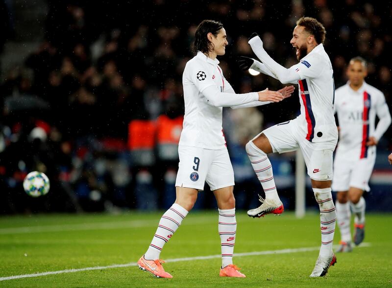 PSG's Edinson Cavani celebrates scoring their fifth goal with Neymar. Reuters