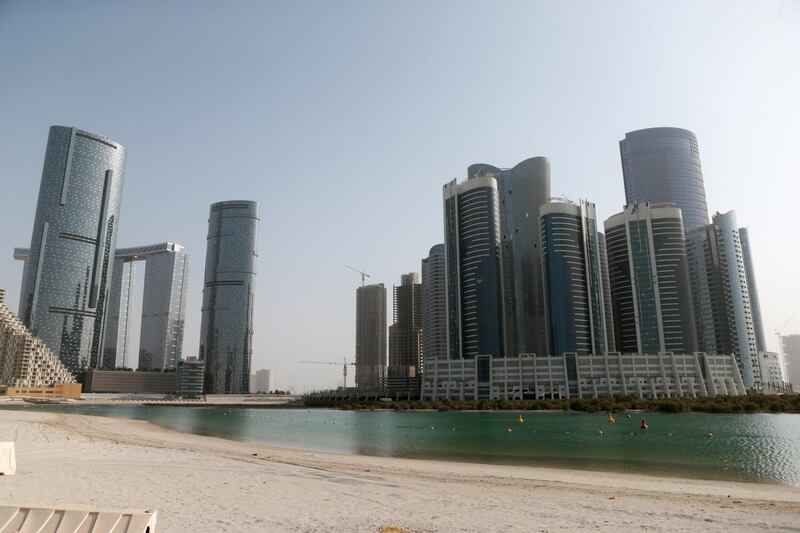 Abu Dhabi, United Arab Emirates, August 12, 2015:     General view of the Shams development complex on Al Reem Island in Abu Dhabi on August 12, 2015. Shown from left to right, Shams development with the Sun Tower far left, The Gate Towers, Sky Tower and Hydra Avenue, the City of Lights (not open yet) far right. Christopher Pike / The NationalReporter:  N/ASection: Business *** Local Caption ***  CP0812-bz-STOCK-Shams16.JPG
