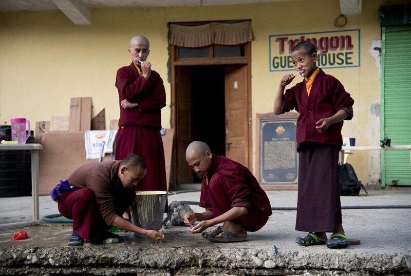 A group of young monks brush their teeth at the Kongri monastery. Thomas Cytrynowicz / AP Photo