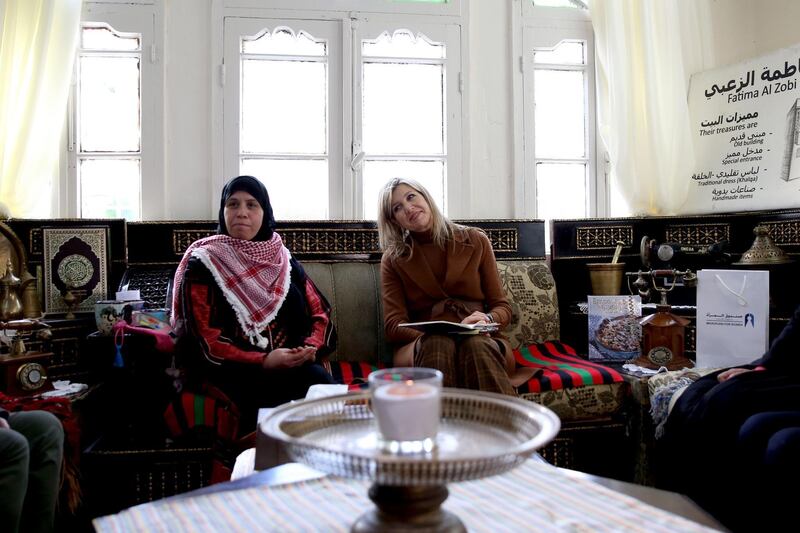 Queen Maxima of Netherlands visits the house of Jordanian national Fatima Al Zobi in Salt. AFP