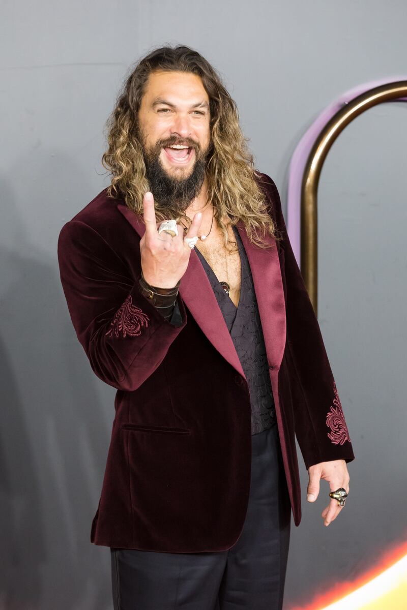 Jason Momoa chose a velvet jacket paired with a black brocade waistcoat for the evening. EPA