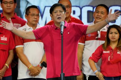 Presidential candidate Ferdinand "Bongbong" Marcos Jr greets the crowd during a campaign rally in Quezon City, Philippines, in April.  AP