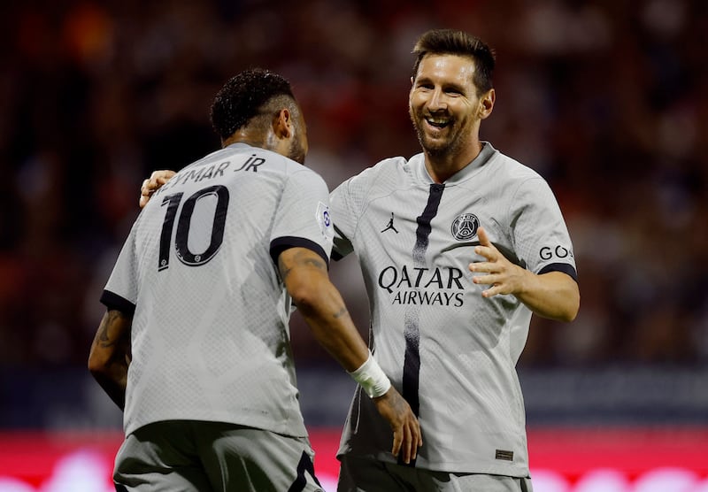 Paris Saint-Germain's Lionel Messi celebrates scoring the fourth goal with Neymar. Reuters