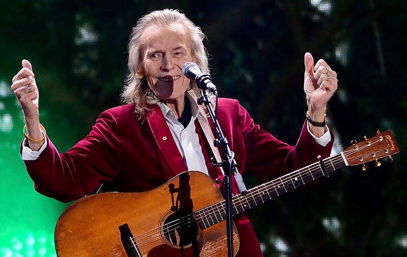 Gordon Lightfoot performs during the evening ceremonies of Canada's 150th anniversary of Confederation, in Ottawa, Ontario, on July 1, 2017.  The legendary folk singer-songwriter, whose hits including “Early Morning Rain,” and “The Wreck of the Edmund Fitzgerald," told a tale of Canadian identity that was exported worldwide, died on Monday, May 1, 2023, at a Toronto hospital, according to a family representative.  He was 84.  (Sean Kilpatrick / The Canadian Press via AP)