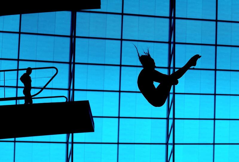 An athlete dives into the pool during a Great Britain Diving Team Launch in the London Aquatics Centre at Queen Elizabeth Olympic Park  in London, England. Getty
