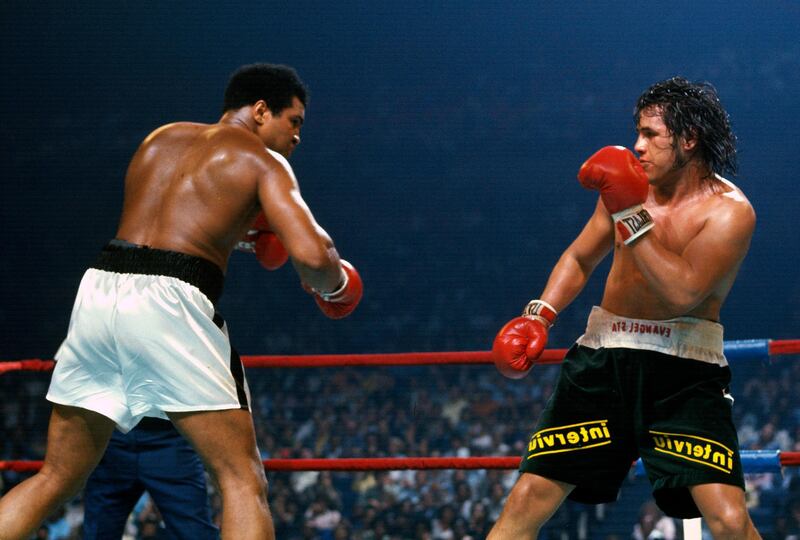 LANDOVER, MD - MAY 16: Mohammad Ali, left, battles with Alfredo Evangelista, right, during an WBC/WBA heavyweight championship fight on May 16, 1977 at the Capital Center  in Landover, Maryland. Ali won the fight with a unanimous decision. (Photo by Focus on Sport/Getty Images) 