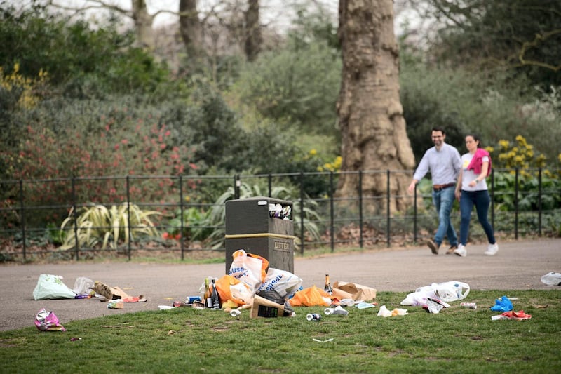 Bins overflow with rubbish in Battersea Park in south London after yesterday's record breaking warm weather. Picture date: Wednesday March 31, 2021. The UK may be about to experience its hottest March on record with temperatures forecast to soar to around 25C (77F). (Photo by Stefan Rousseau/PA Images via Getty Images)
