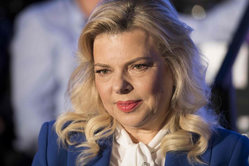 (FILES) In this file photo taken on May 21, 2017, Sara Netanyahu, the wife of the Israeli Prime Minister, attends a ceremony marking the 50th anniversary of the 1967 Israeli-Arab War, in the Old City of Jerusalem. Sara Netanyahu was charged with fraud and breach of trust on June 21, 2018 after a long police probe into allegations she falsified household expenses, the justice ministry said. / AFP / EPA POOL  / ABIR SULTAN
