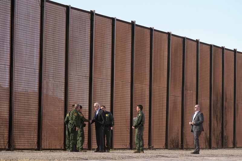 President Joe Biden greets US Border Patrol agents at the border fence in El Paso, Texas. AP