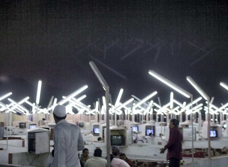 Ahmed Mater (Saudi, born 1979). Neon Café, 2012. C-print, 60 x 90 in. (152.4 x 228.7 cm). Courtesy of the artist. © Ahmed Mater
