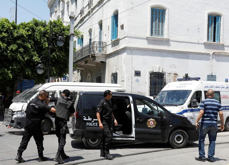 Police officers are seen at the site of an explosion in downtown Tunis, Tunisia, June 27, 2019. REUTERS/Zoubeir Souissi