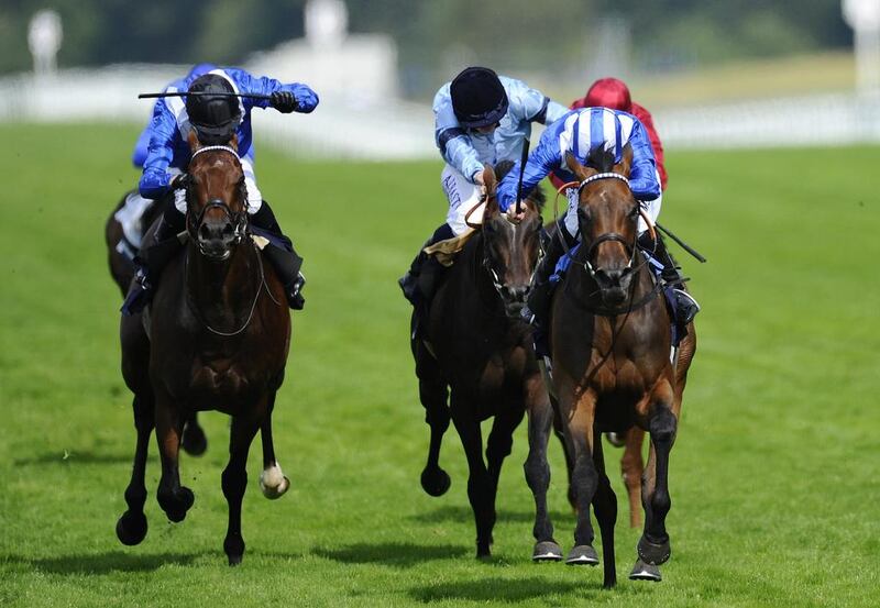 Paul Hanagan riding Taghrooda, right, win The King George VI And Queen Elizabeth Stakes at Ascot. Getty Images