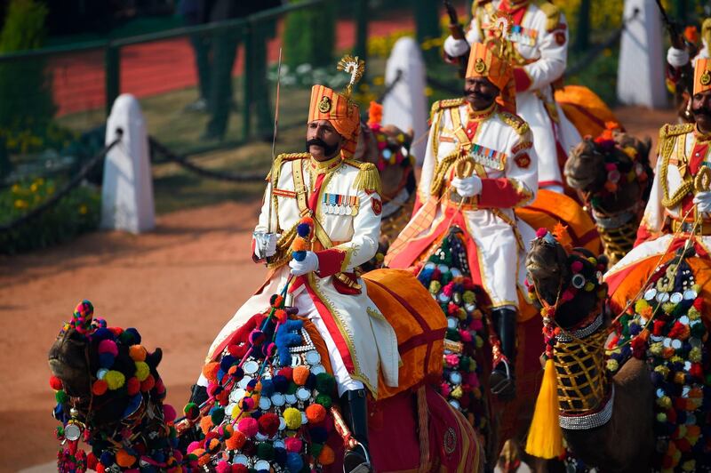 Camel-mounted Border Security Force contingent marches along Rajpath during the Republic Day parade in New Delhi. AFP