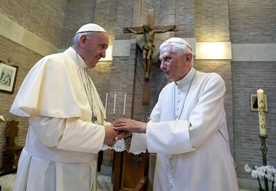 Pope Francis, left, with his predecessor Pope Benedict XVI, right. The Pope will eulogise his friend at his funeral Mass on Thursday. AP