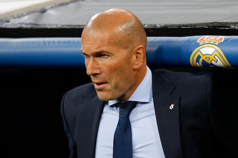 Real Madrid coach Zinedine Zidane looks at the game during a Champions League group H soccer match between Real Madrid and Apoel Nicosia at the Santiago Bernabeu stadium in Madrid, Spain, Wednesday, Sept. 13, 2017. (AP Photo/Francisco Seco)