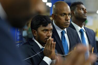 Charith Senanayake, centre, resigned as Sri Lanka manager following the first Test loss to England in Galle in November. AFP