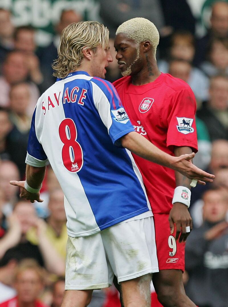 LIVERPOOL, ENGLAND - OCTOBER 15 : Djibril Cisse of Liverpool squares up to Robbie Savage of Blackburn during the Barclays Premiership match between Liverpool and Blackburn Rovers on October 15,  2005 at Anfield in Liverpool, England.  (Photo by Laurence Griffiths/Getty Images)