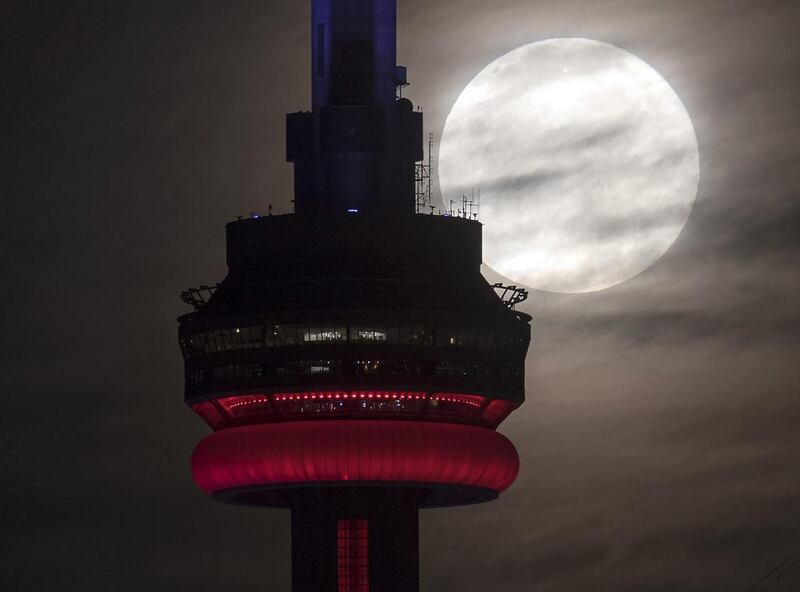 The supermoon behind the CN tower in Toronto. Frank Gunn / The Canadian Press via AP