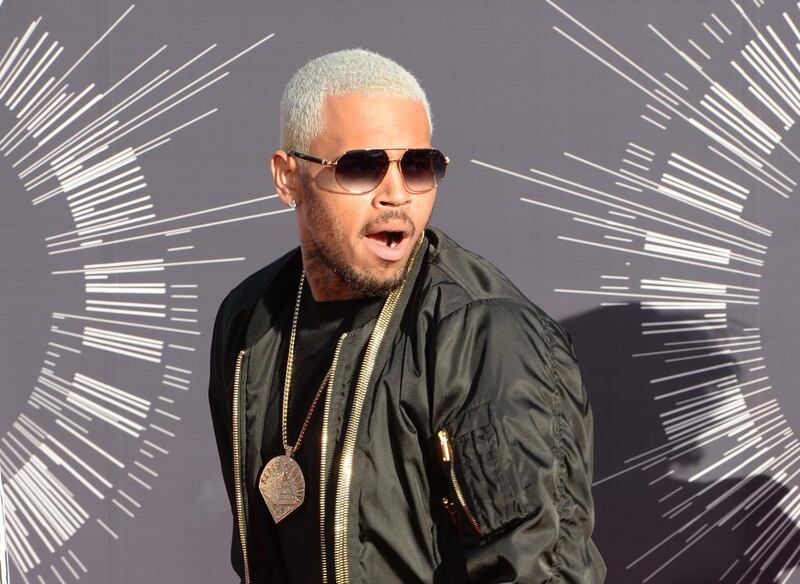Chris Brown took to swearing and break-dancing as he ranted about being stranded in the Philippines over a row with an influential sect. The 26-year-old was stopped from leaving the Philippine capital on July 22, a day after performing at a Manila concert, amid a fraud complaint filed against him by the indigenous Christian group Iglesia ni Cristo (Church of Christ). Mark Ralston / AFP photo