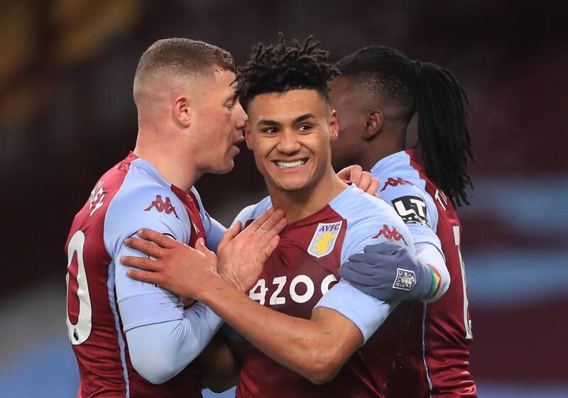 Soccer Football - Premier League - Aston Villa v Newcastle United - Villa Park, Birmingham, Britain - January 23, 2021 Aston Villa's Ollie Watkins celebrates scoring their first goal with Ross Barkley and Bertrand Traore Pool via REUTERS/Mike Egerton EDITORIAL USE ONLY. No use with unauthorized audio, video, data, fixture lists, club/league logos or 'live' services. Online in-match use limited to 75 images, no video emulation. No use in betting, games or single club /league/player publications.  Please contact your account representative for further details.