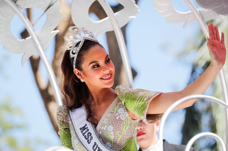 Miss Universe 2018 Catriona Gray of the Philippines waves to the crowd during a homecoming parade in Manila. EPA