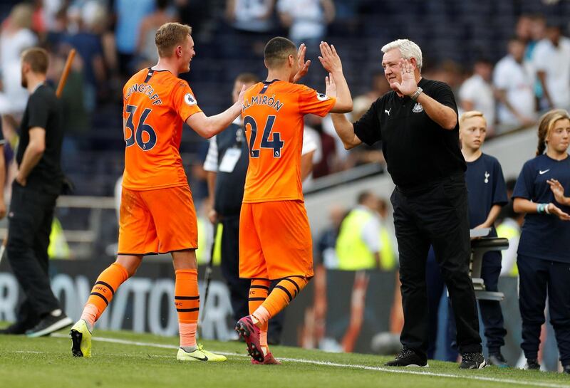 Newcastle United manager Steve Bruce congratulates his players. Reuters