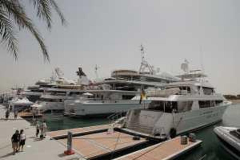 ABU DHABI, UNITED ARAB EMIRATES - March 14, 2009: The final day of the Abu Dhabi Yacht Show at the Marina across from the Abu Dhabi National Exhibition Centre. 
( Ryan Carter / The National ) *** Local Caption ***  RC001-YachtShow.JPGRC001-YachtShow.JPG