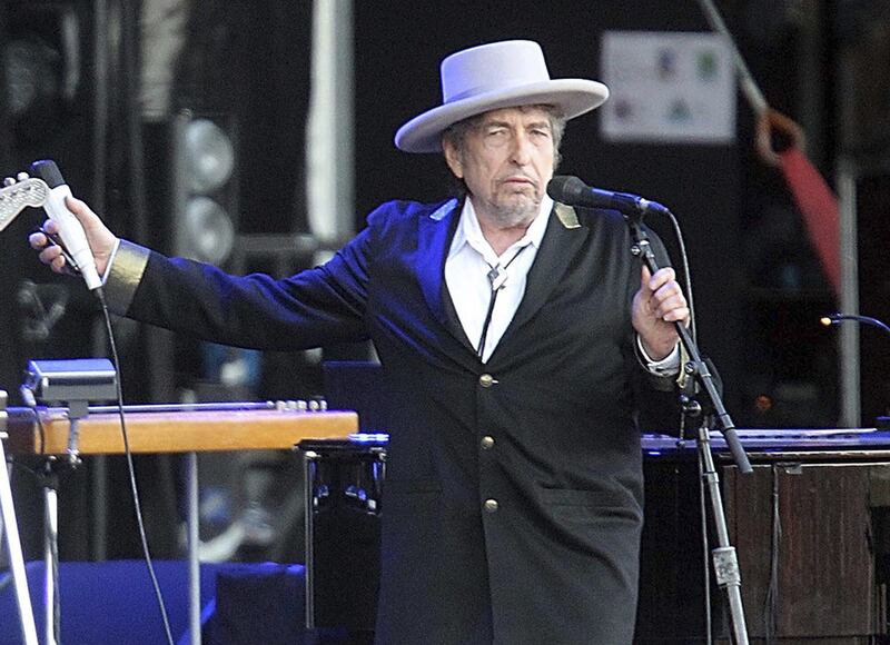 Bob Dylan performs at Les Vieilles Charrues festival in Carhaix, France, on July 22, 2012. He collected his 2016 Nobel prize for literature on April 1, 2017 while in Stockholm for concerts to promote his latest album. David Vincent / AP Photo